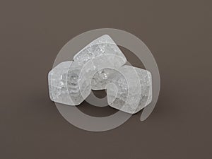 Crackle glass or Sugar quartz beads on a brown background