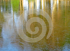 Crackled Icy Lake Autumn Trees Reflection. photo