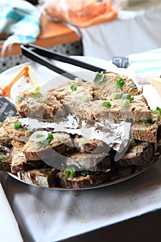 Cracklings spreading with bread