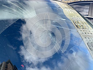 Cracks in a broken car windshield