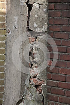 Cracks in concetre and bricks in een old farm in Oldebroek in the Netherlands. photo