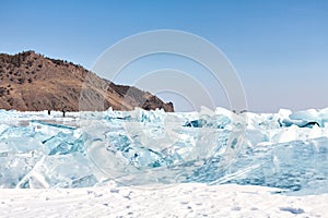 Cracks and ice blue ice on the surface of Lake Baikal, Siberia