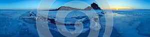 Big cracks in the ice of Lake Baikal at the Shaman Rock on Olkhon Island. .Cylindrical panorama 360