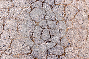 Cracks in the old pavement as a background