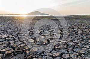 Cracks on the surface of the earth are altered by the shrinkage of mud due to drought photo