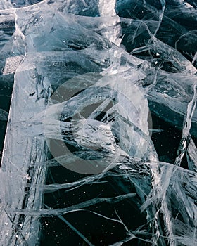 Cracks surface of the frozen lake of Baikal lake in winter season. ice texture cracks baikal