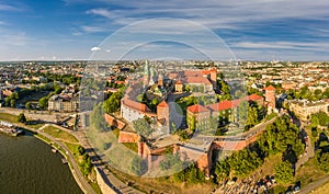 Cracow from the bird`s eye view - city landscape with castle and Wawel Cathedral. Panoram of the city from the air.