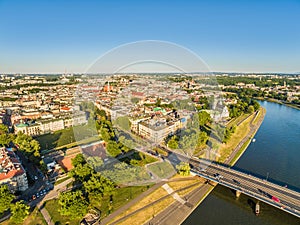 Cracow - Kazimierz from the bird`s eye view. City landscape with Vistula river and Grunwaldzki bridge.