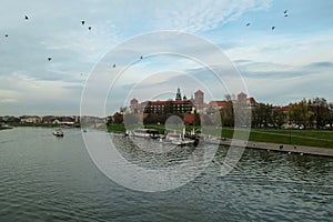 Cracow - A panoramic view on the iconic Wawel Castle in Cracow, Poland and the Vistula river flowing under the castle