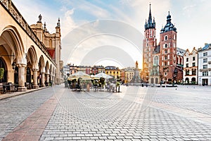 Cracow, Poland old town and St. Mary's Basilica seen from Cloth hall at sunrise