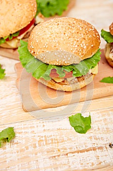 Craft beef burger  on wooden table on light background