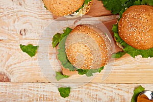 Craft beef burger  on wooden table on light background