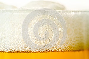 Craft Beer Glass with Bubble Froth Close Up, Refreshing Cold Drink Background