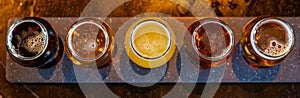 Craft beers served together in a sampler tray