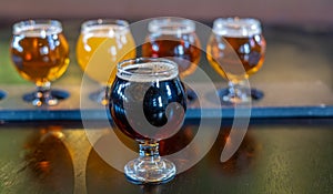 Craft beers served together in a sampler tray