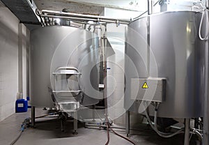 Craft brewery tanks and pipes with manometers in private microbrewery