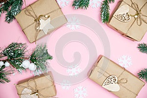 craft gifts with fir twigs on a pink background