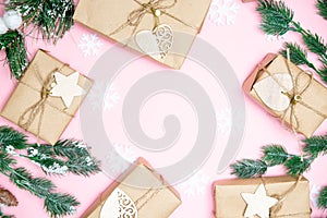 craft gifts with fir twigs on a pink background