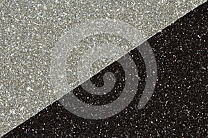 Craft glitter paper in the colours of black & silver.