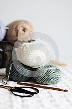 Craft hobby background with yarn in natural colors. Recomforting, destressing hobby