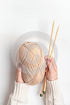 Craft hobby background with yarn in natural colors. Recomforting, destressing hobby