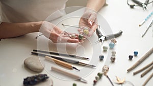 Craft jewelery making with professional tools. A handmade jeweler process, manufacture of jewellery.
