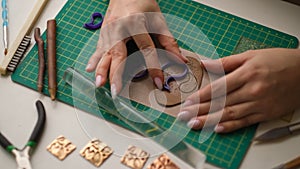 Craft jewelery making with professional tools. A handmade jeweler process, manufacture of jewellery.