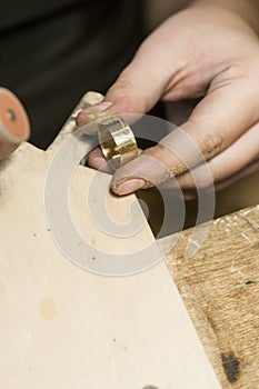 Craft jewelery making. Ring polishing. Macro shot