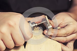 Craft jewelery making. Ring polishing. Macro shot