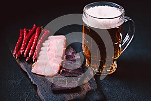 Craft lager beer and meat snacks set. bar table