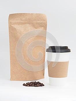 Craft paper bag for coffee and paper coffee cup with copy space for branding logo. Mockup for coffee to go concept