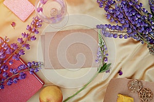 Craft paper mock up. Summer feminine invitation, birthday card, Mother& x27;s day concept. Lupins purple flowers, apple