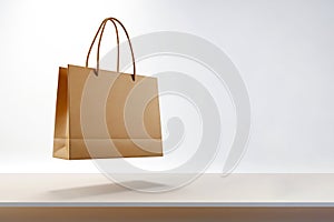 Craft paper sale bag on white background. Brown clear empty blank paper shopping bag with handles made from recycled paper. Eco