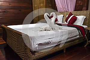 Crafted Towel and Rattan Bed photo