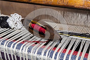 Crafting a handmade carpet, loom detail