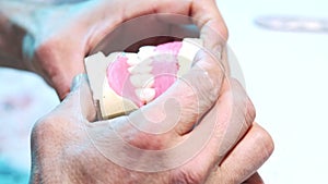 Crafting precision in dental prosthetics, a close-up view of denture fabrication