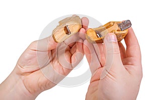 Craftman holding miniature hand planes