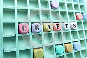 Crafts word made with building wooden blocks