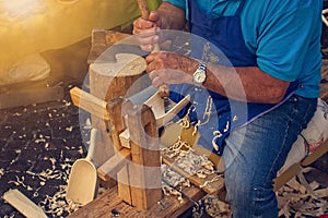 Craftsman carpenter builds wooden tools