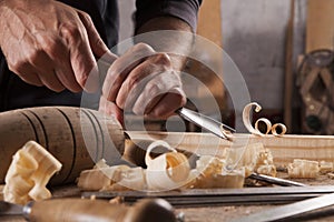 Craftsman carve with a gouge