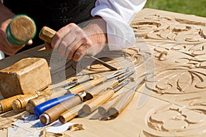 Craftsman carving wood