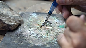 Craftsman diamond bracelet production welding white gold bracelet. hand made jewelery close up macro shooting