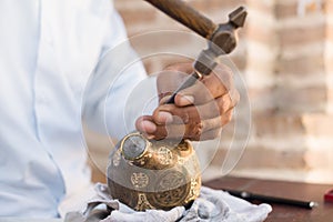 Chaser of copper at work