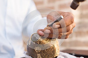 Chaser of copper at work