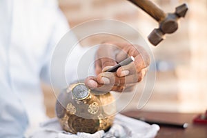 Chaser of copper at work