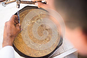 Chaser of copper at work