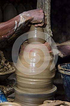 Craftsman hands making ceramic works in Maragogipinho in the city of Aratuipe, Bahia photo