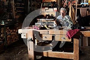 Craftsman making luxury handmade man shoes