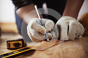 Craftsman measuring plank