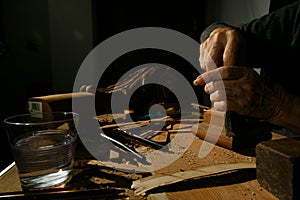 Craftsman& x27;s hands working on wood carving, with gouge and chisel Cabinetmaker, carpentry